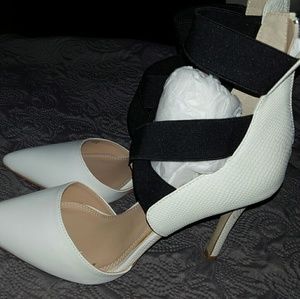 Brand new white high strap heels